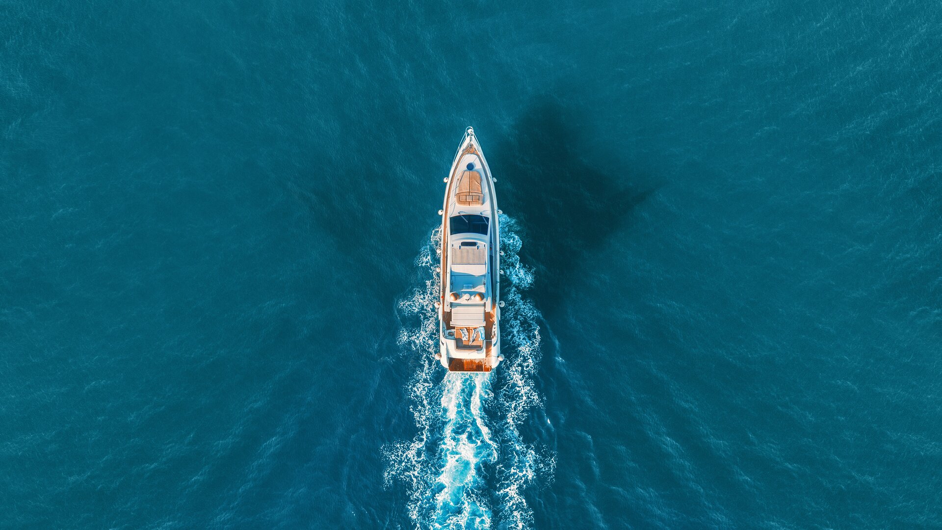 Yacht from above in the sea.