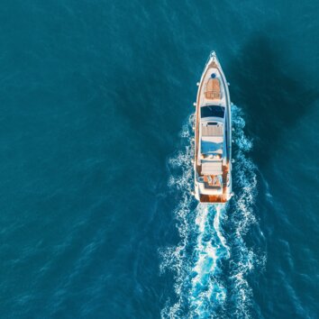 Yacht from above in the sea.